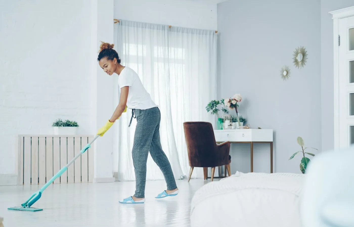 House cleaning crew in a modern kitchen