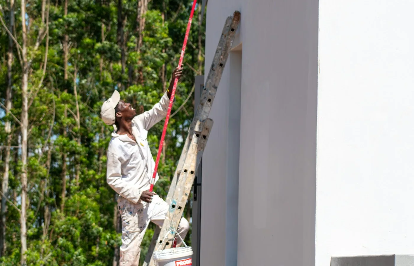 Painting contractor working on a house exterior